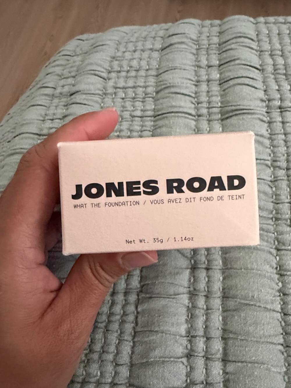 Jones Road foundation box in pale beige with black logo
